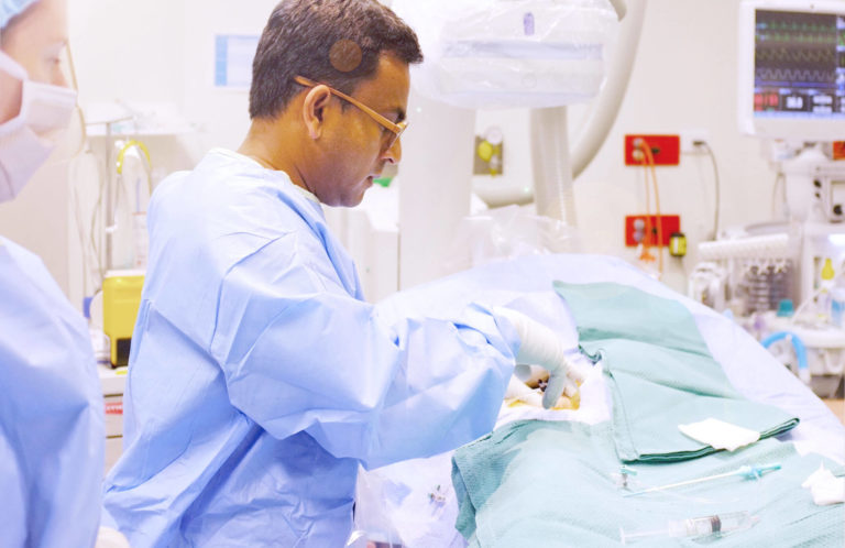 hoto of doctor performing heart operation